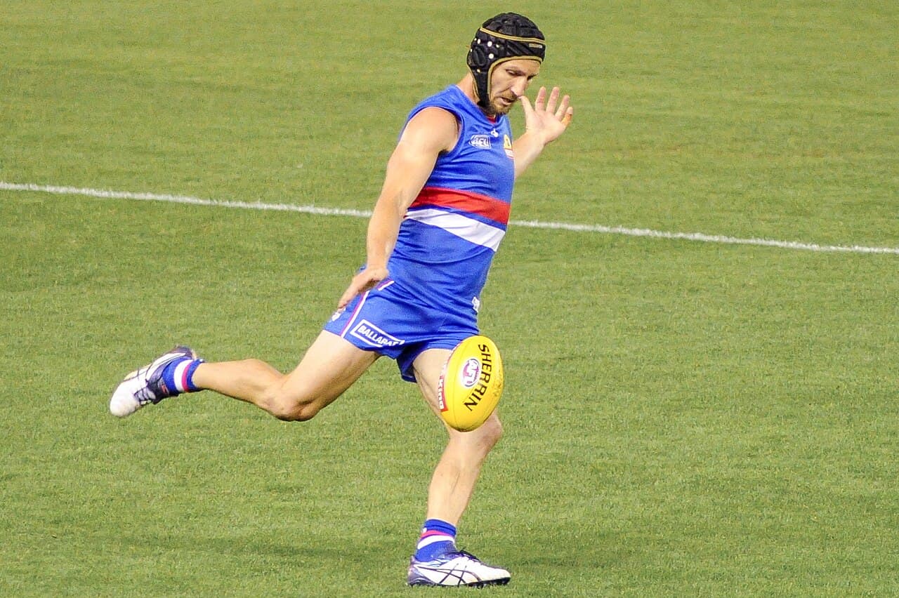 Matthew Boyd kicking during the AFL round two match between the Western Bulldogs and Sydney on 31 March 2017 at the…