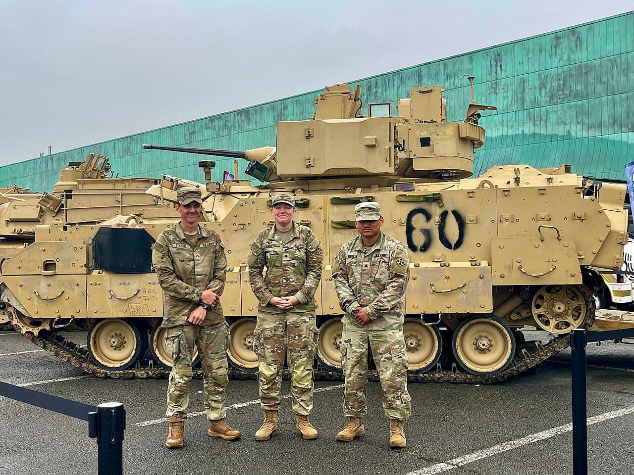 U.S. Army Pfc. Kaleb Stilwell, Spc. Mackenzie Cooper, and Sgt. Luis Murillo, Bradley fighting vehicle crew members,…