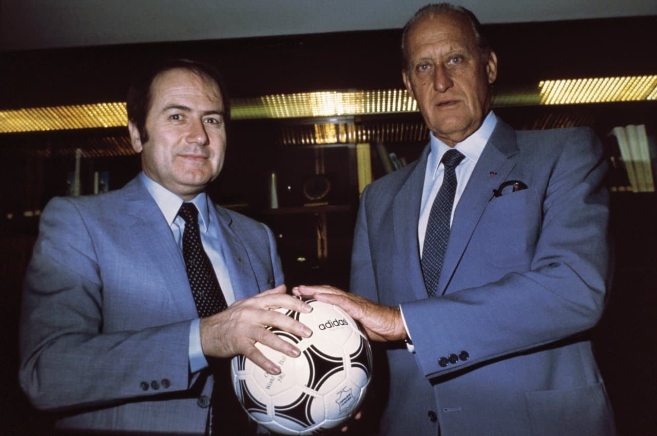 Joseph "Sepp" Blatter, General Secretary of FIFA, and João Havelange, President of FIFA, holding the Adidas Tango…