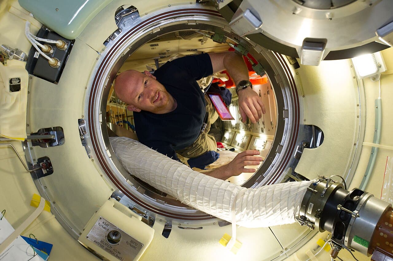 European Space Agency astronaut Alexander Gerst, Expedition 40 flight engineer, is pictured in the Rassvet…