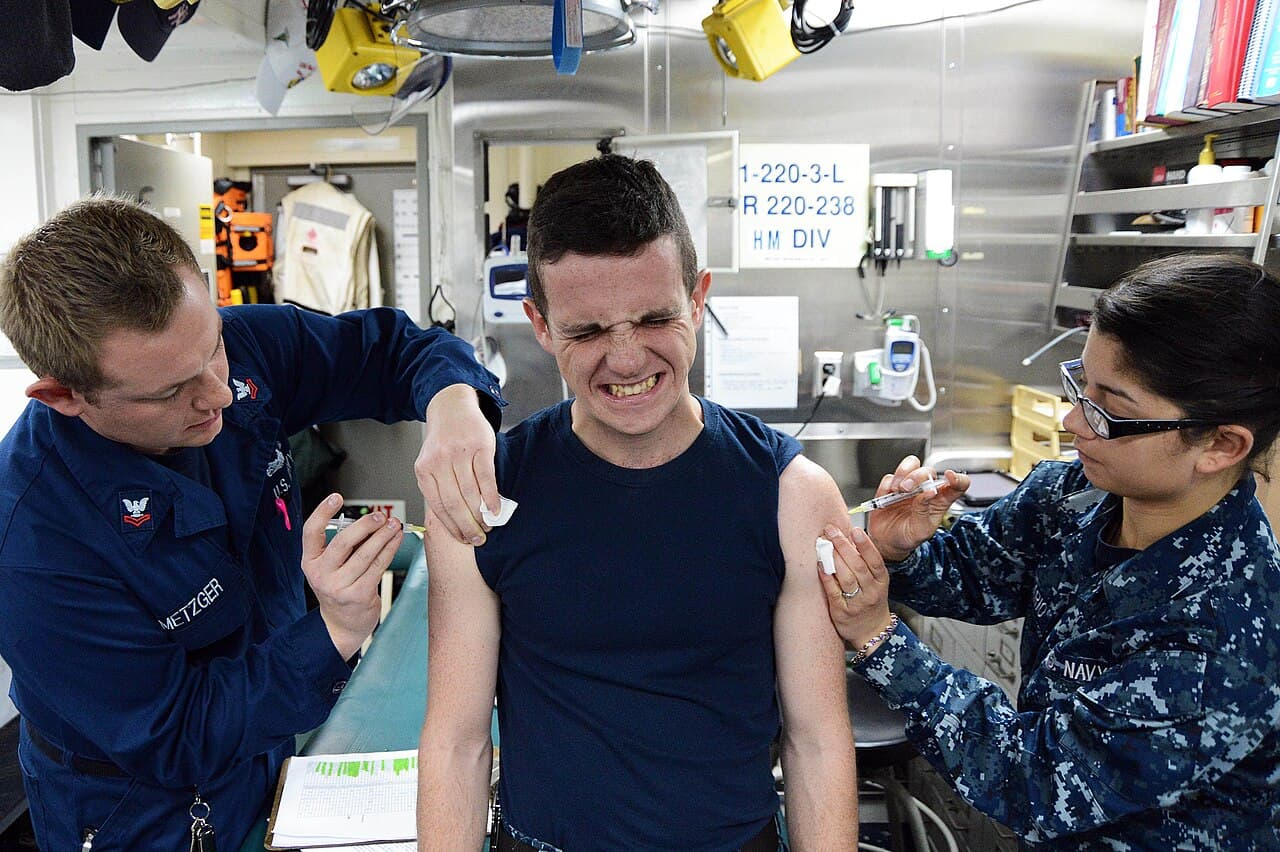 WATERS WEST OF THE KOREAN PENINSULA (March 18, 2013) Hospital Corpsman 2nd Class Ken Metzger, left, and Hospitalman…