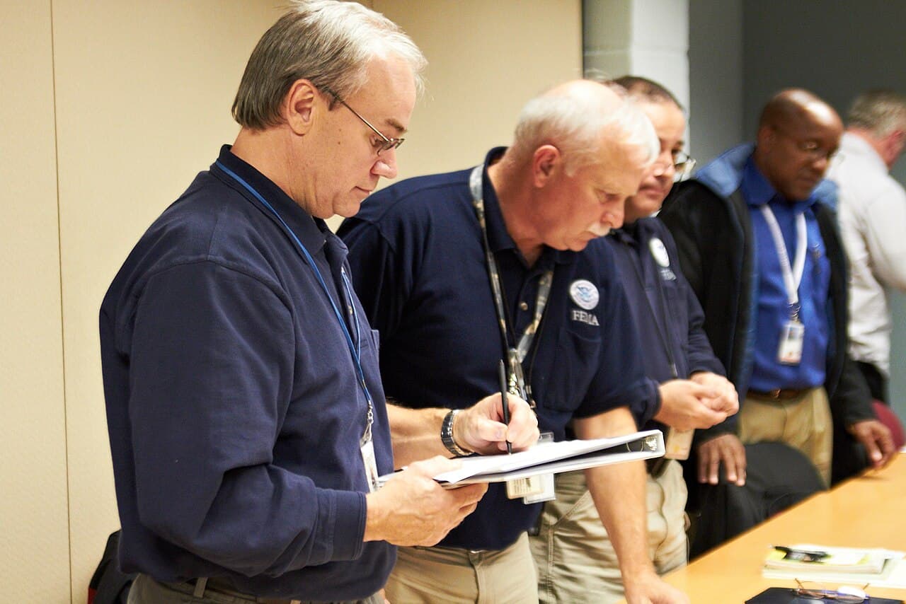 Queens, NY, November 3, 2010 -- FEMA project specialist Paul Ogiba schedules meetings with NYC Parks and Recreation…