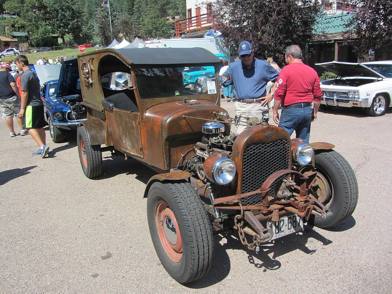 Not a Ford chassis and maybe not a Ford body, but the grille is. I think that is a Ford inline six, though. Bear trap…