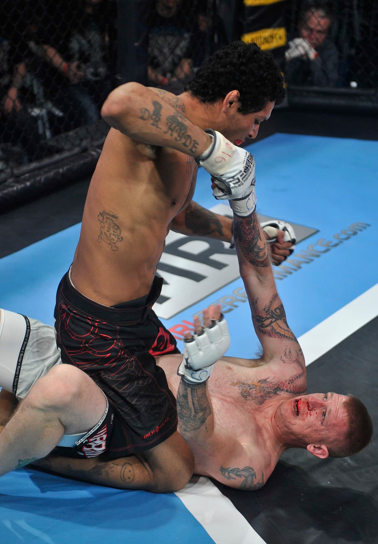 Jeremiah Talley, left, delivers a strike to Todd Sheffield’s nose at the Buckley MMA Fight Night, Feb. 9, 2013, at the…