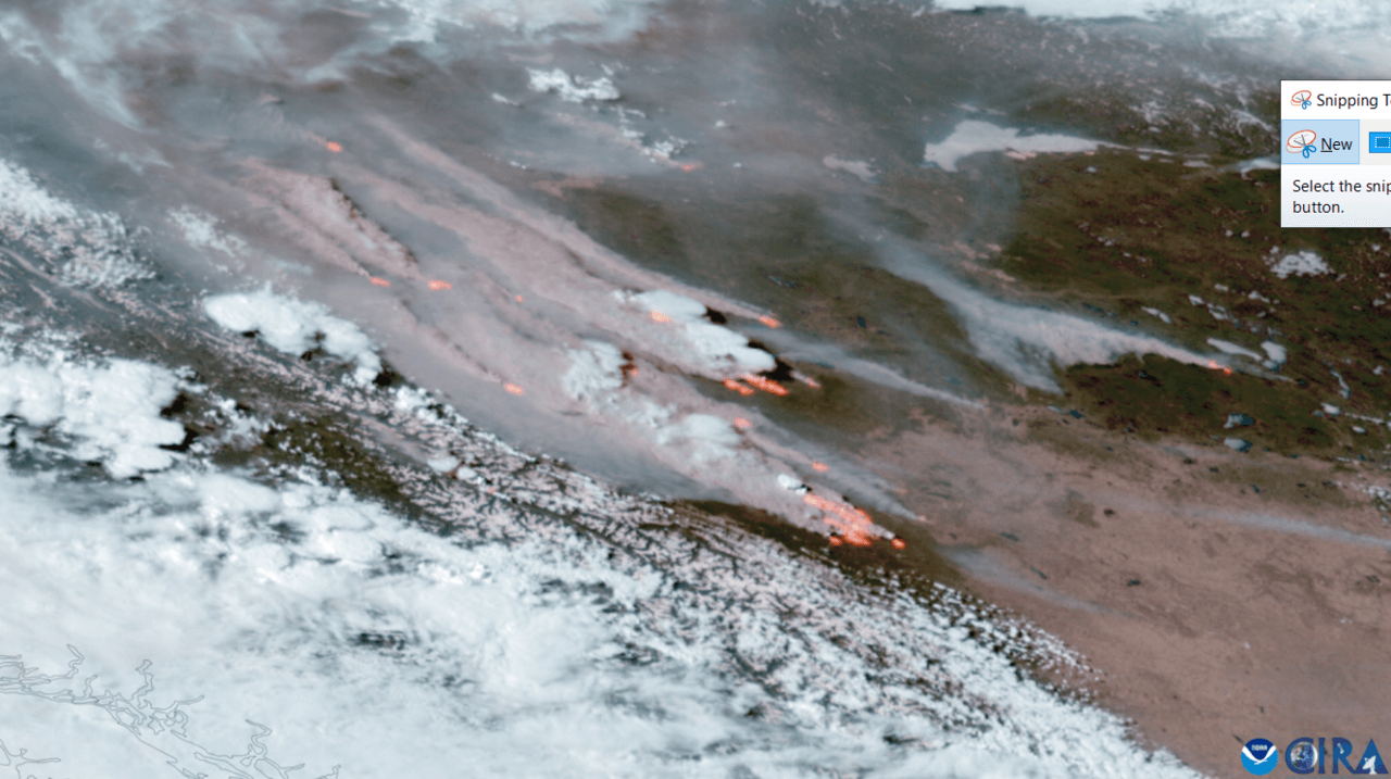 A GOES-18 satellite image of a cluster of wildfires in Alberta, Canada.