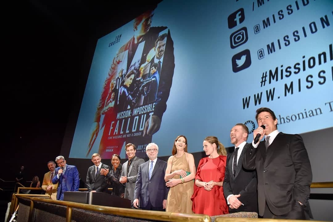 An image of cast and crew promoting w:Mission: Impossible – Fallout (2018) in 2018. From right to left, those featured…