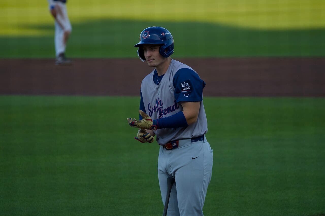 Cubs prospect Josiah Hartshorn adjusts his batting gloves as he prepares to bat for the South Bend Cubs against the…
