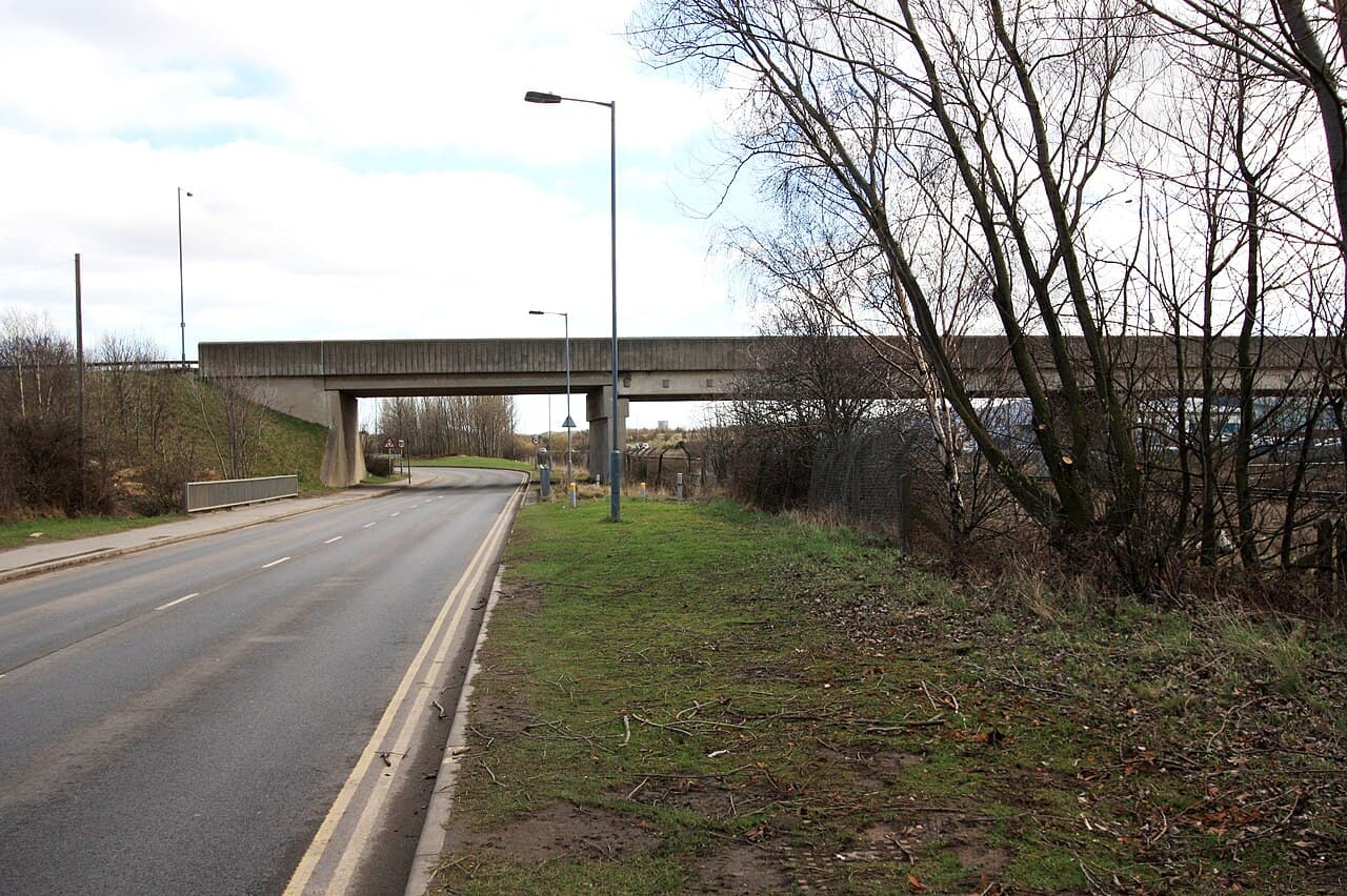The B1513 road-bridge This photograph shows a view of the bridge that carries the B1513 road over the…